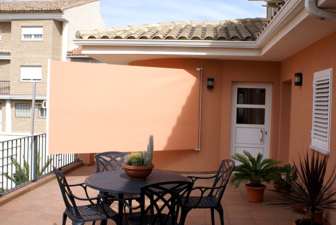 toldo telon lateral u horizontal para un porche